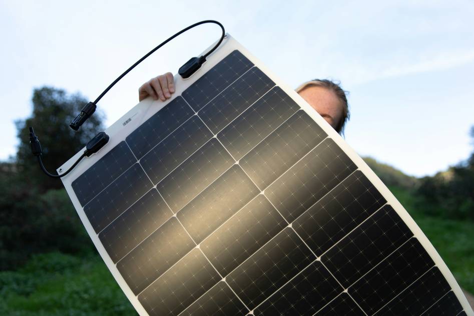 Eco-friendly home with curved solar arrays