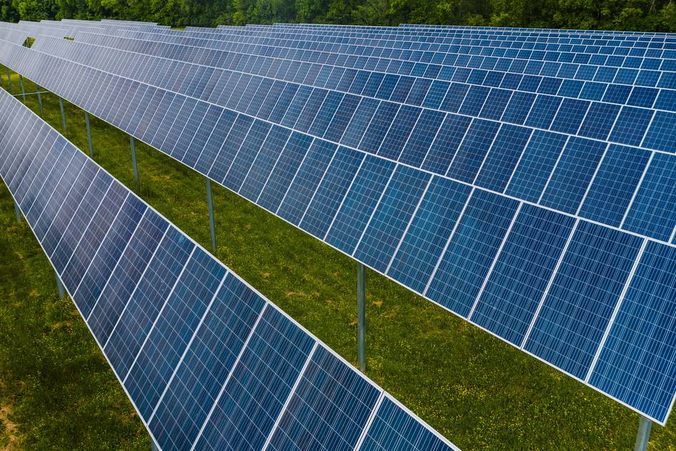 Flexible solar panels installed on curved rooftop with sunlight