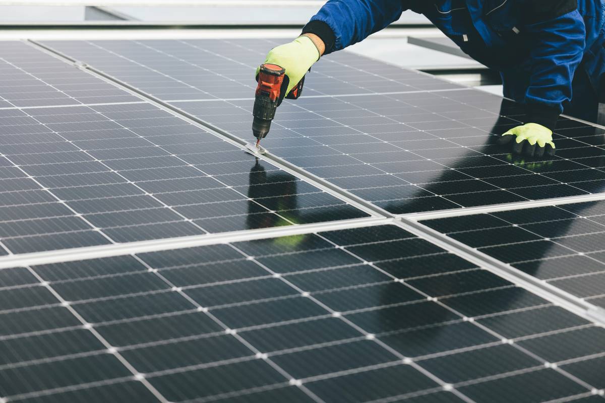 Side-by-side comparison showing weight and thickness of thin flexible solar panels vs traditional rigid panels